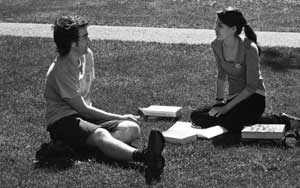 Two grads taking a break outside